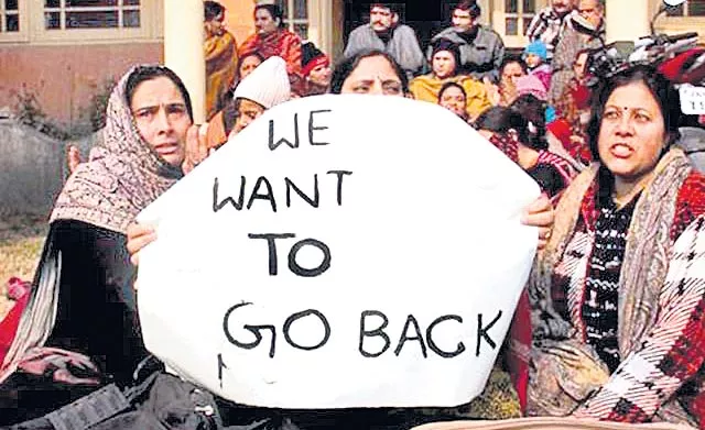 kashmiri pandits return to kashmir - Sakshi