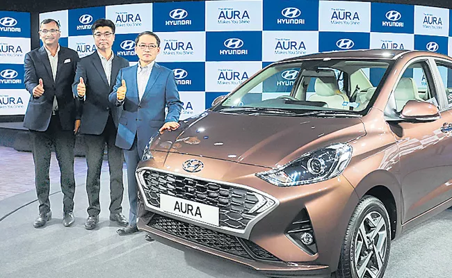 Hyundai Launches Compact Sedan Aura - Sakshi