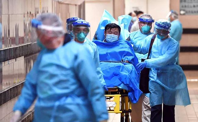 Corona virus: China death toll climbs to 80 - Sakshi