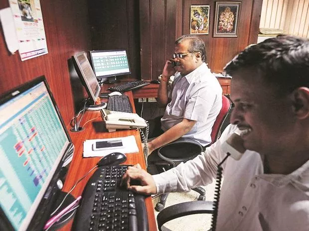 Stocks Gain On Favourable Global Cues - Sakshi