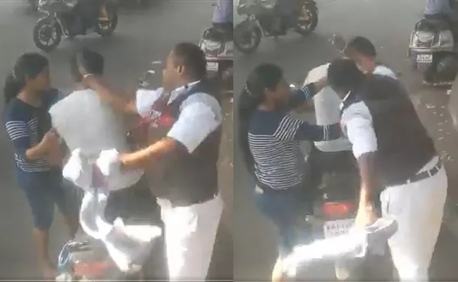 BMTC Volvo Bus Driver Attack On Biker In Bengaluru - Sakshi