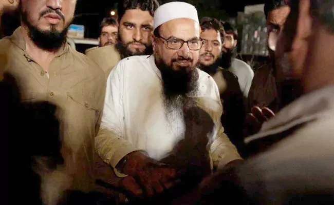 Hafiz Saeed Convicted In Two Terror Funding Cases - Sakshi