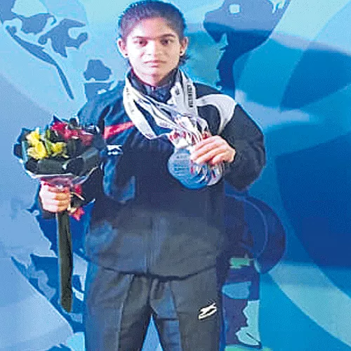 Telangana Sports School Lifter Pavani Won Two Silver Medals - Sakshi