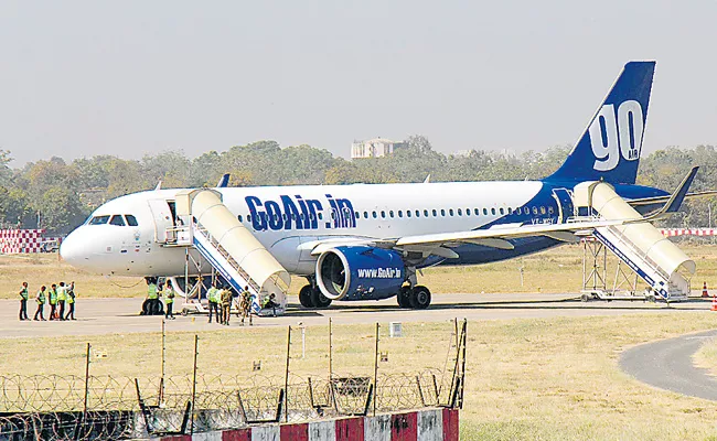 Flames In Flight Engine At Ahmedabad - Sakshi