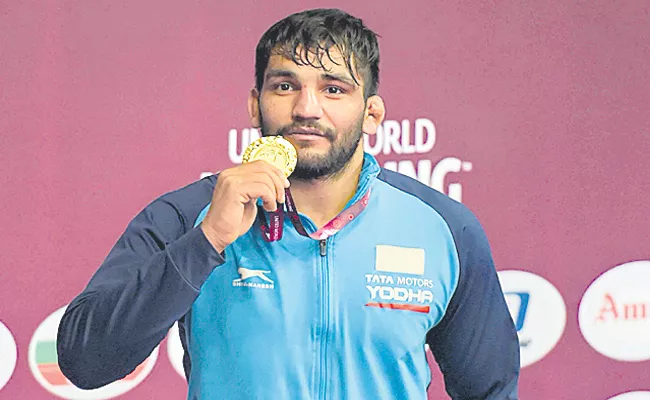 Sunil Kumar Won The Medal In Asian Wrestling Greco Roman - Sakshi