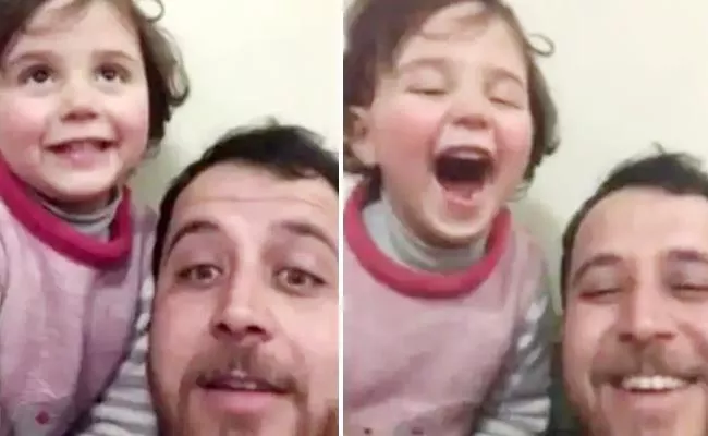 Syrian Man Teaches Daughter To Laugh At Explosions Melts Heart - Sakshi