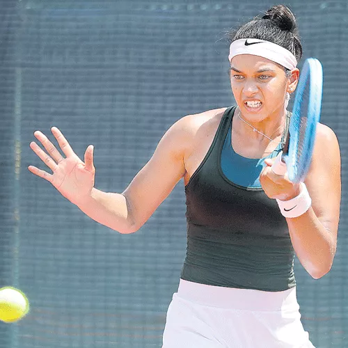 Sowjanya Bavisetti Enters Pre Quarters Of ITF Tourney Singles - Sakshi