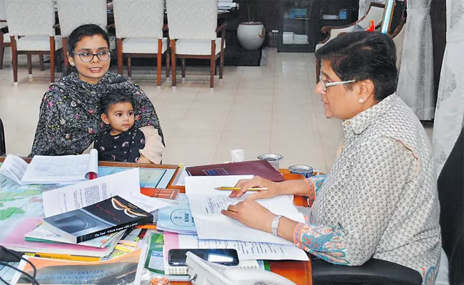 Kiran Bedi Allows Woman Officer Child In Official Meeting Puducherry - Sakshi