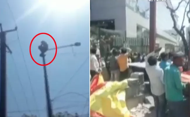 Drunk Man Climbed Electricity Pole Creates Fuss In Secunderabad - Sakshi