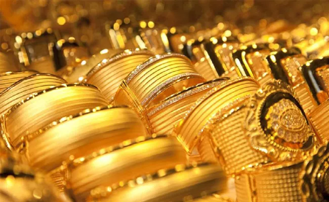 Gold ends nearly 2persant higher as coronavirus fears - Sakshi