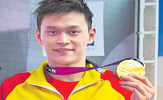 Eight Years Ban For Triple Olympic Champion Sun Yang - Sakshi