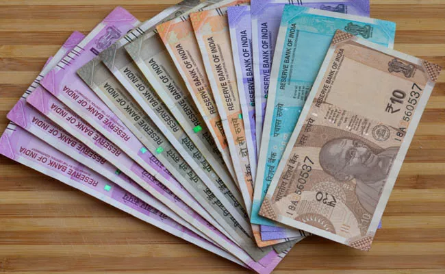 Rupee rises 19 paise to 71.19 against US dollar in early trade     - Sakshi