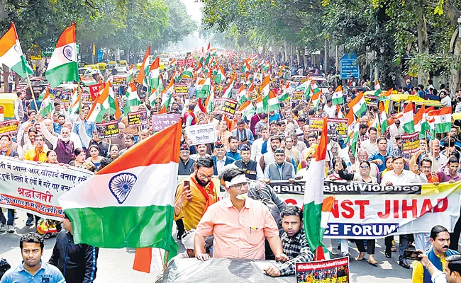 Delhi Peace Forum Protest At Delhi In Favour Of Citizenship Amendment Act - Sakshi