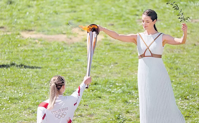 Shooting Champion Anna Karaoke Lighted The Tokyo Olympic Cauldron - Sakshi