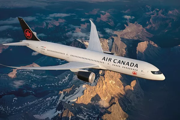 Air Canada To Lay Off Employees Due To Coronavirus - Sakshi