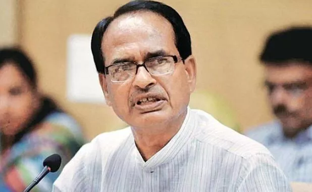 Madhya Pradesh CM post frontrunner Chouhan to people - Sakshi