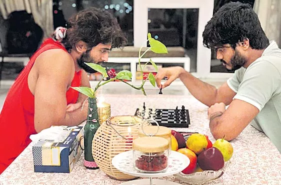 VijayDeverakonda a ND AnandDeverakonda Playing Chess at Home - Sakshi