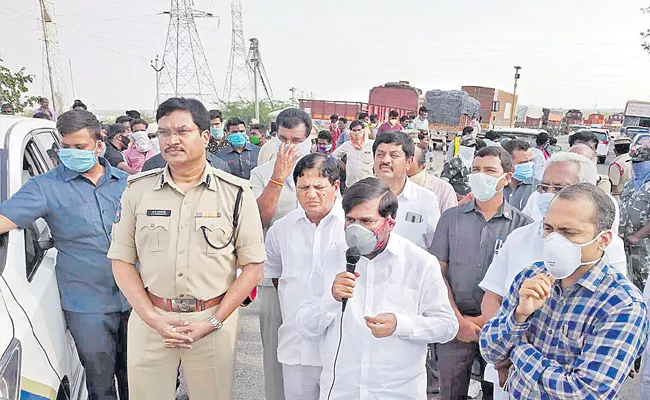 Heavily Parked Vehicles At Vaadapalli Bridge - Sakshi