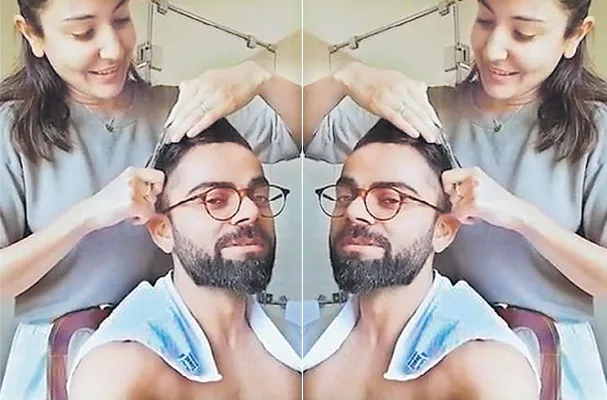 Anushka Sharma Gives Virat Kohli A Haircut With Kitchen Scissors - Sakshi