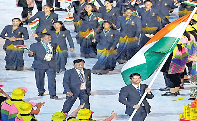 International Olympic Committee Decided To Bring Two Members From Each Country As A Flag Bearers - Sakshi