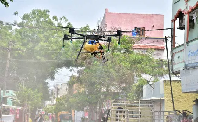 Sodium hypochloride Spraying At Corona Isolation centers In Vijayawada - Sakshi