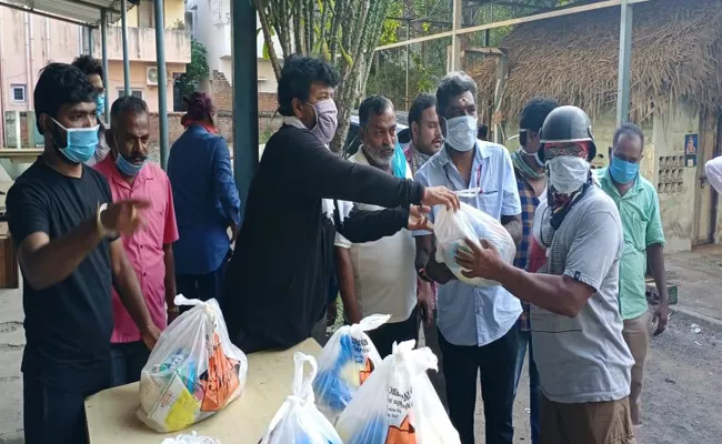 Actor Vishal Distribute Ration To Nadigar Sangam Members - Sakshi