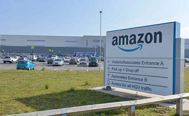 Coronavirus: Amazon warehouse workers walk out - Sakshi