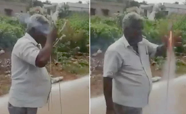 Viral Video: Man Launching Rocket Crackers With His Cigarette - Sakshi