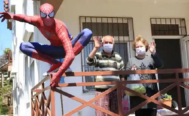 Man In Spiderman Dress Helping To The Elderly In Turkey - Sakshi