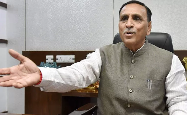 Gujarat Shop Openings Not To Convenience Ramzan: CM Rupani - Sakshi