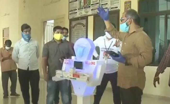 Helping Hands Managers Gave Robot To Covid-19 Officials For Serving Corona Positive In Nellore - Sakshi