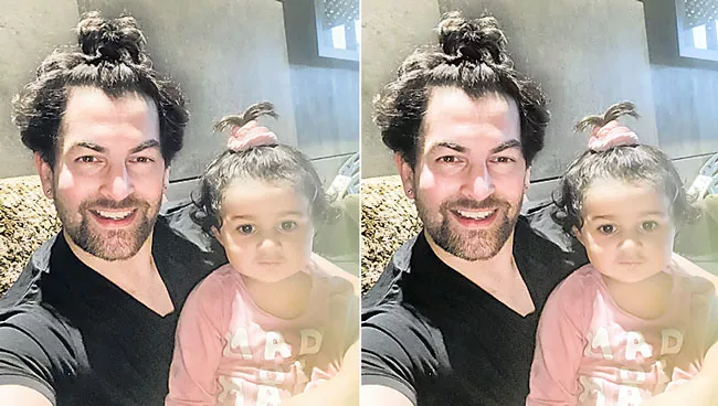 Neil Nitin Mukesh shares cute photo with daughter Nurvi - Sakshi