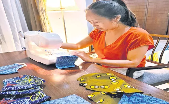 Stitching Of Masks By British Lady In Hyderabad - Sakshi