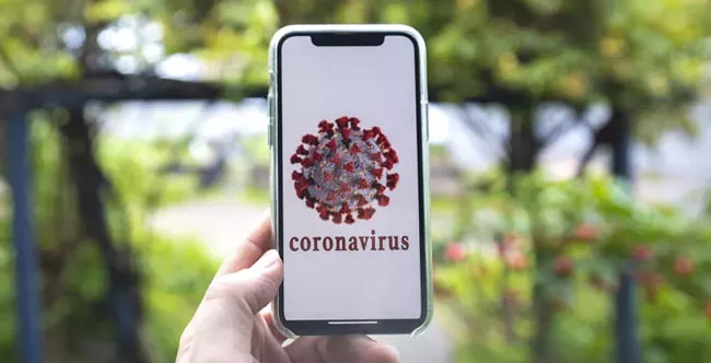 Mobile phones can spread coronavirus - Sakshi