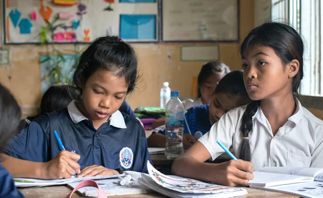 Cambodian Teacher Drives  about 20 km  To Teach His Students  - Sakshi