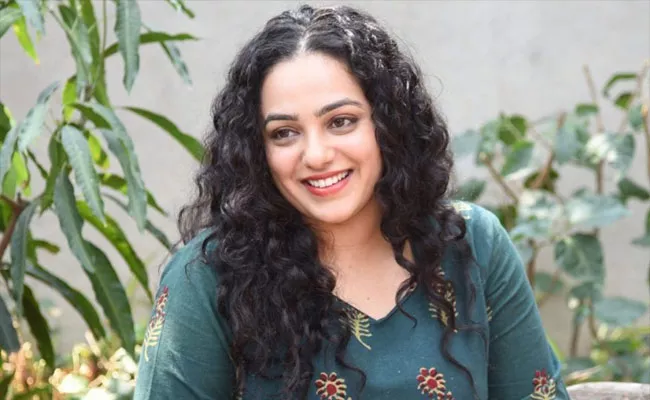 Nithya Menen Auctions Her Dress For Coronavirus Charity - Sakshi