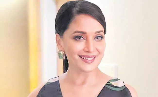 Bollywood actress Madhuri Dixit shares teaser of her first single Candle - Sakshi