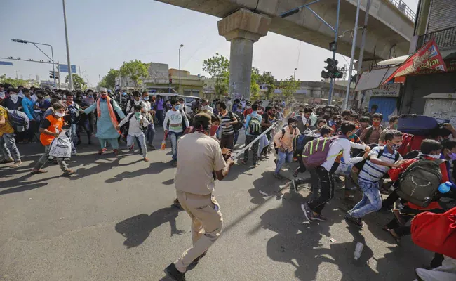 Migrant Workers Send Legal Notice To IIM In Ahmedabad - Sakshi