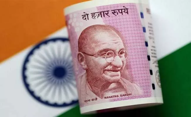 Rupee falls 34 paise against US dollar - Sakshi