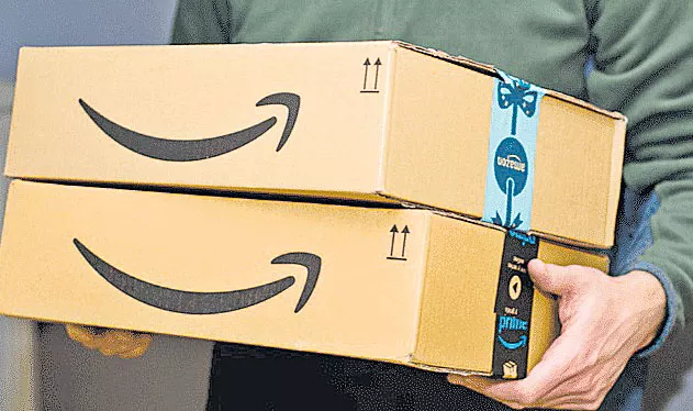 Amazon creating 50000 temporary jobs - Sakshi