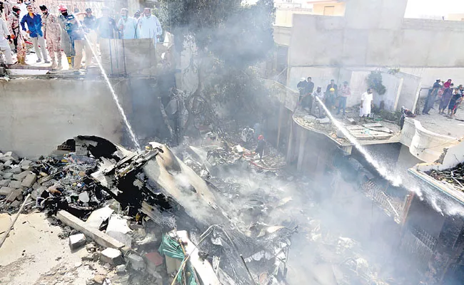  Pakistan International Airlines Plane Crashes in Karachi - Sakshi