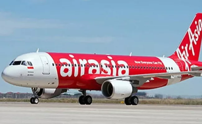 Air Asia Flight Emergency Landing At Shamshabad Airport - Sakshi