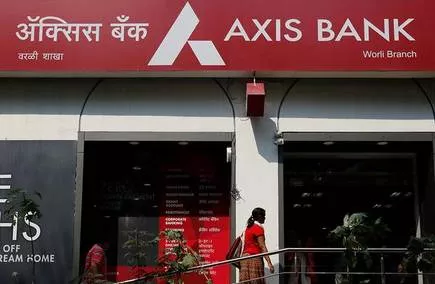 Carlyle group may invest in Axis Bank - Sakshi