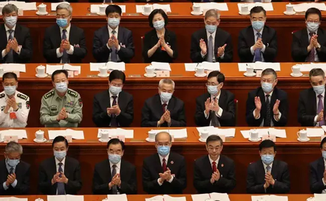 China parliament approves controversial Hong Kong security law - Sakshi