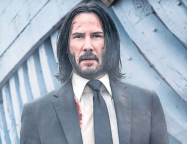 Keanu Reeves starrer John Wick 4 pushed to 2022 owing to the Corona Virus - Sakshi