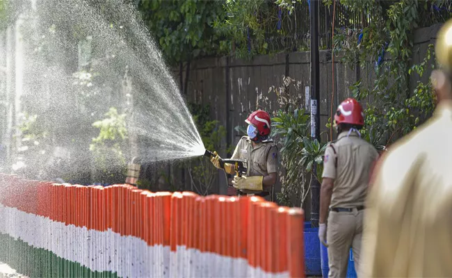 Spraying disinfectant in public places kill the Corona virus! - Sakshi