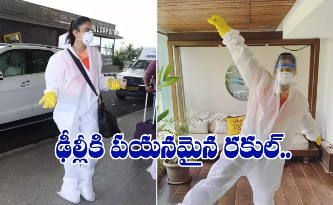 Rakul Preet Singh Going To Delhi In PPE Gear - Sakshi