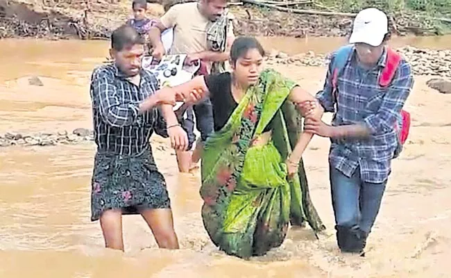  Pregnant Woman Crossed Bridge At Bhadradri - Sakshi