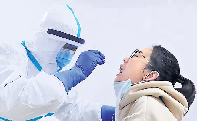 China begins mass testing in Beijing as 67 new cases appear - Sakshi