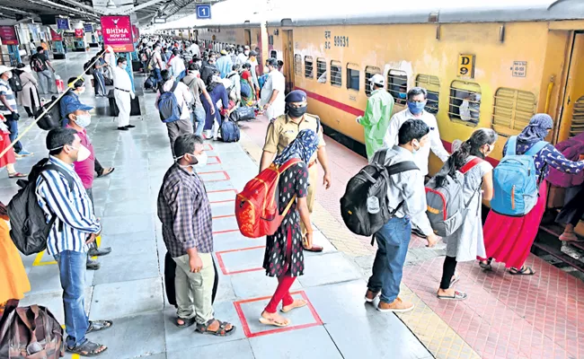 Health protocol in 18 railway stations in AP - Sakshi